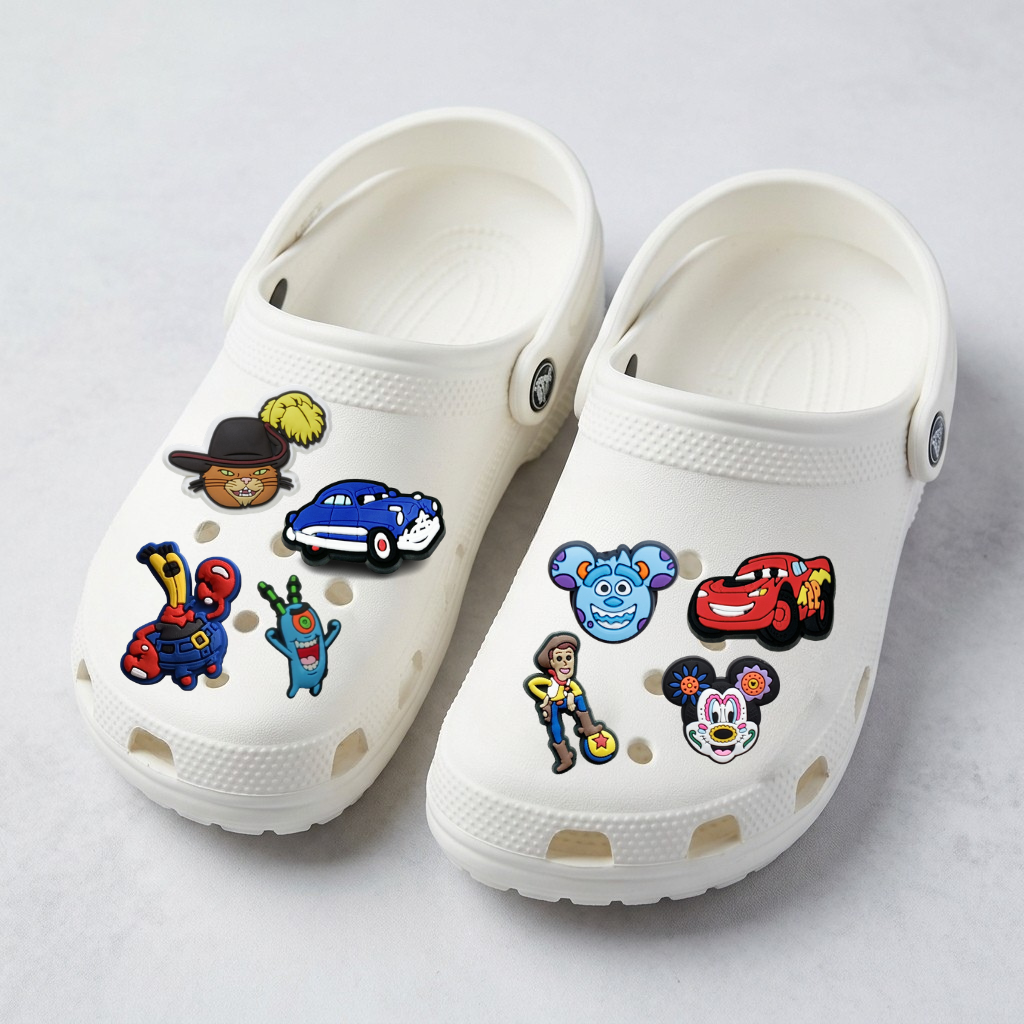 Набір джибітсів для кроксів (Crocs) «Мульт-герої» — Аксесуари Блискавка Маквін, Вуді, Кіт у чоботях, Планктон, 8 шт., фото №1