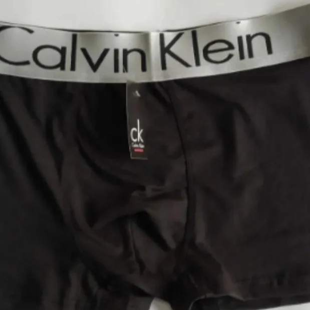 Чоловічі чорні труси боксери Calvin Klein, фото №1 Чоловічі чорні труси боксери Calvin Klein, фото №1