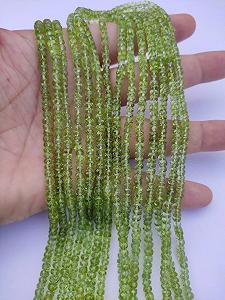 Бусины из натурального перидота, ограненные, рондель, 4-4.5 мм, нить длиной 40 см, зеленый цвет - Фото 1