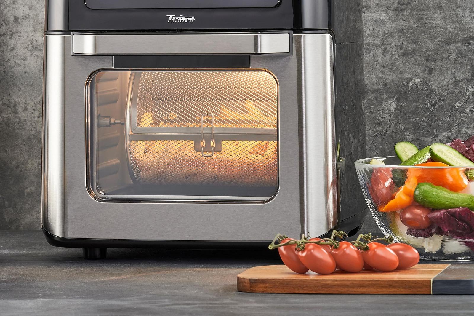 Мультипечь-духовка Trisa Crisp Master XXL 12 л 12-в-1 серебристый/черный, фото №9 Мультипечь-духовка Trisa Crisp Master XXL 12 л 12-в-1 серебристый/черный, фото №9