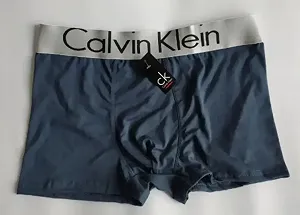 Чоловічі сірі труси боксери Calvin Klein - Фото 1