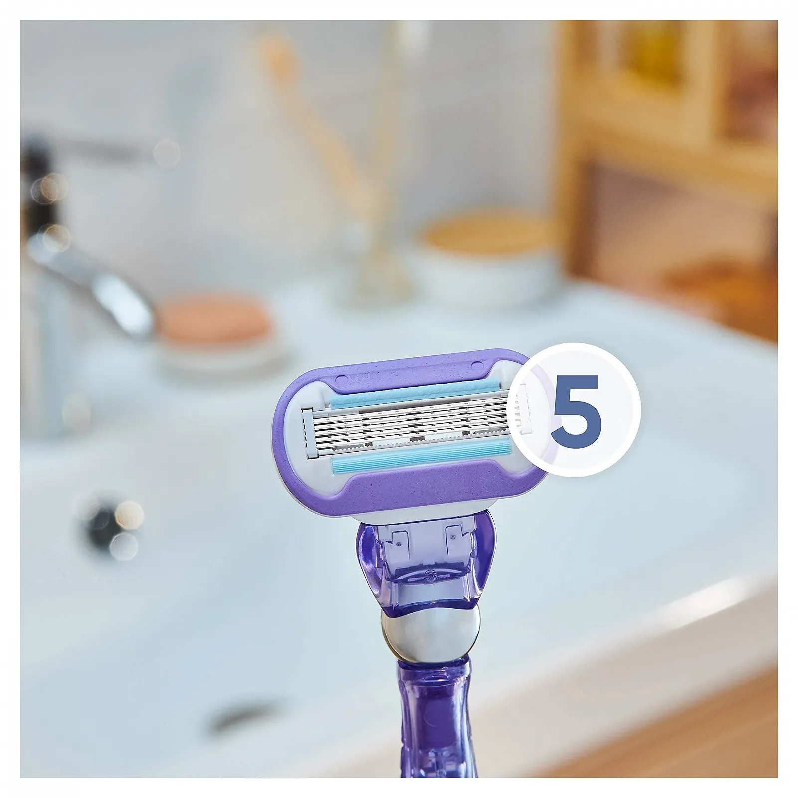 Бритва женская Gillette Venus Deluxe Smooth Swirl с увлажняющими полосками для защиты кожи, станок + 3 лезвия (упаковка из 2 шт), фото №4 Бритва женская Gillette Venus Deluxe Smooth Swirl с увлажняющими полосками для защиты кожи, станок + 3 лезвия (упаковка из 2 шт), фото №4