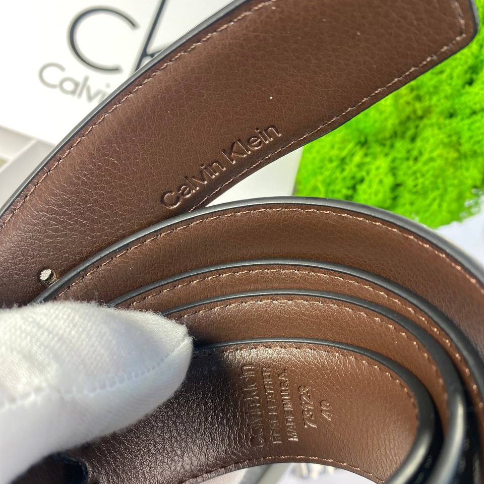 Чоловічий ремінь Calvin Klein шкіряний двосторонній чорно-коричневий з двома пряжками, фото №4 Чоловічий ремінь Calvin Klein шкіряний двосторонній чорно-коричневий з двома пряжками, фото №4