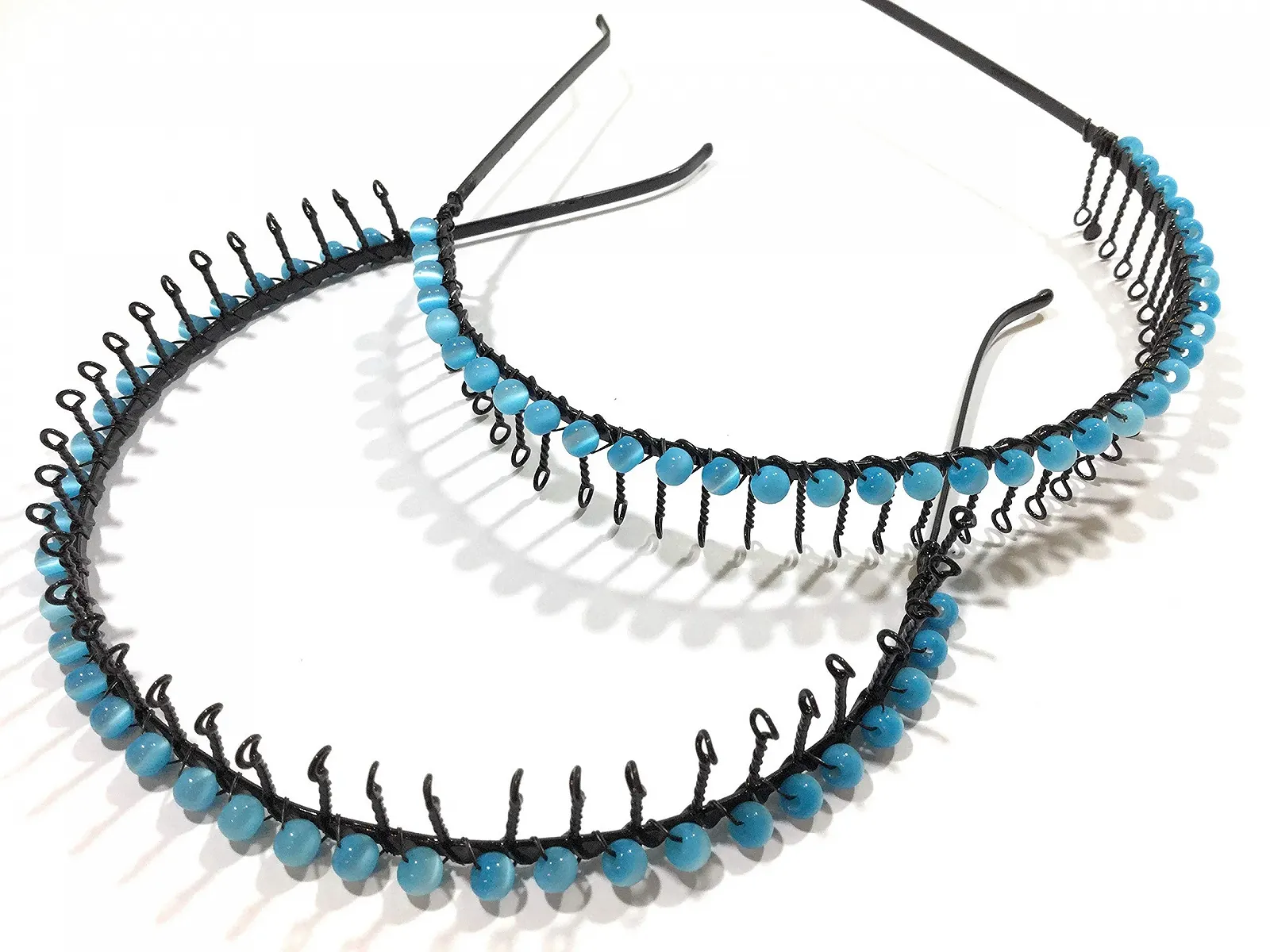 Обруч для волосся Метал із закрученими зубцями з аплікацією у вигляді кульок, фото №1 Обруч для волосся Метал із закрученими зубцями з аплікацією у вигляді кульок, фото №1