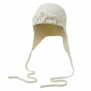 Вязаная шерстяная шапка MHADBKH с цветком и защитой для ушей, элегантная, теплая и мягкая для холодной погоды - Фото 1