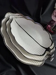 Сервіровочні тарілочки Листочки 3 шт цена на synthetic.ua - Фото 1 Сервіровочні тарілочки Листочки 3 шт synthetic.ua - Фото 1