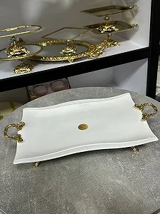 Блюдо порцелянове на маленьких золотих ніжках з золотими ручками 36х25 см ціна на synthetic.ua - Фото 1 Блюдо порцелянове на маленьких золотих ніжках з золотими ручками 36х25 см synthetic.ua - Фото 1