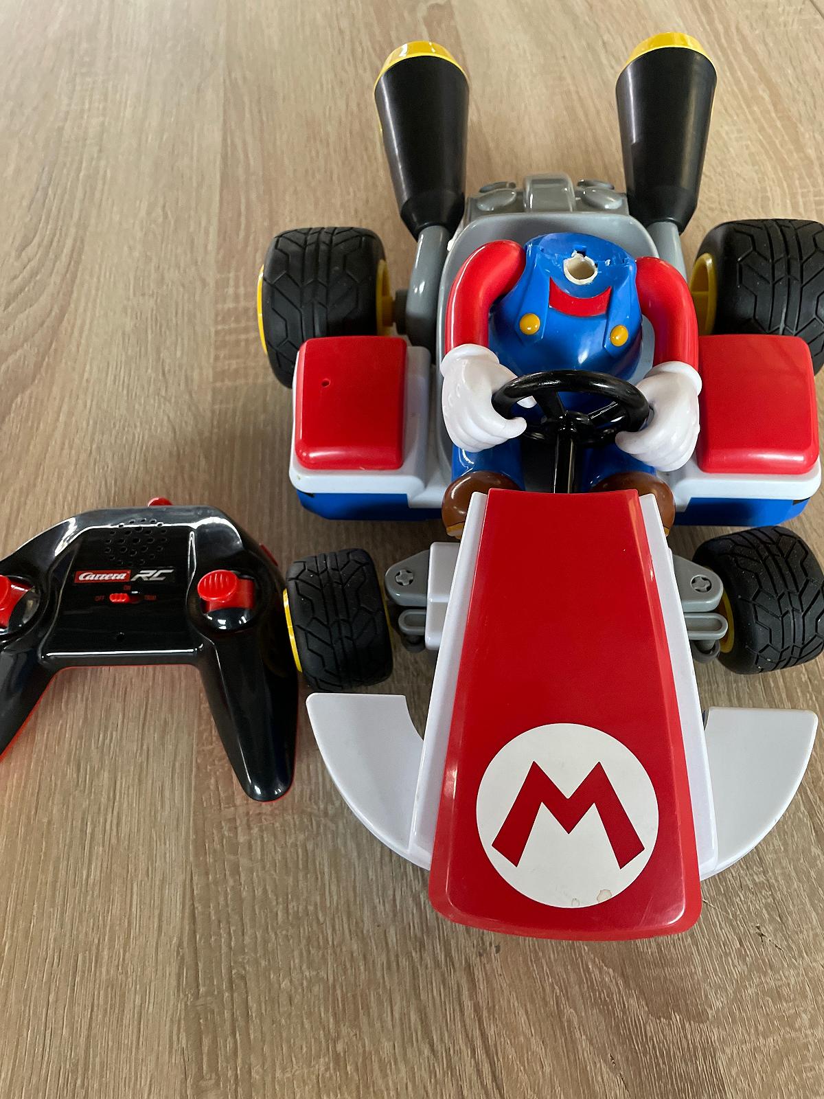 Гоночный автомобиль с дистанционным управлением Carrera RC Mario Race Kart не работает моторчик сломана голова у персонажа, фото №2