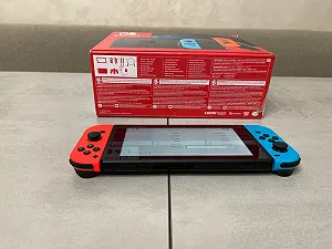 Портативна ігрова приставка Nintendo Switch HAC-001-01 Neon Blue-Red, нова, повний комплект synthetic.ua - Фото 1