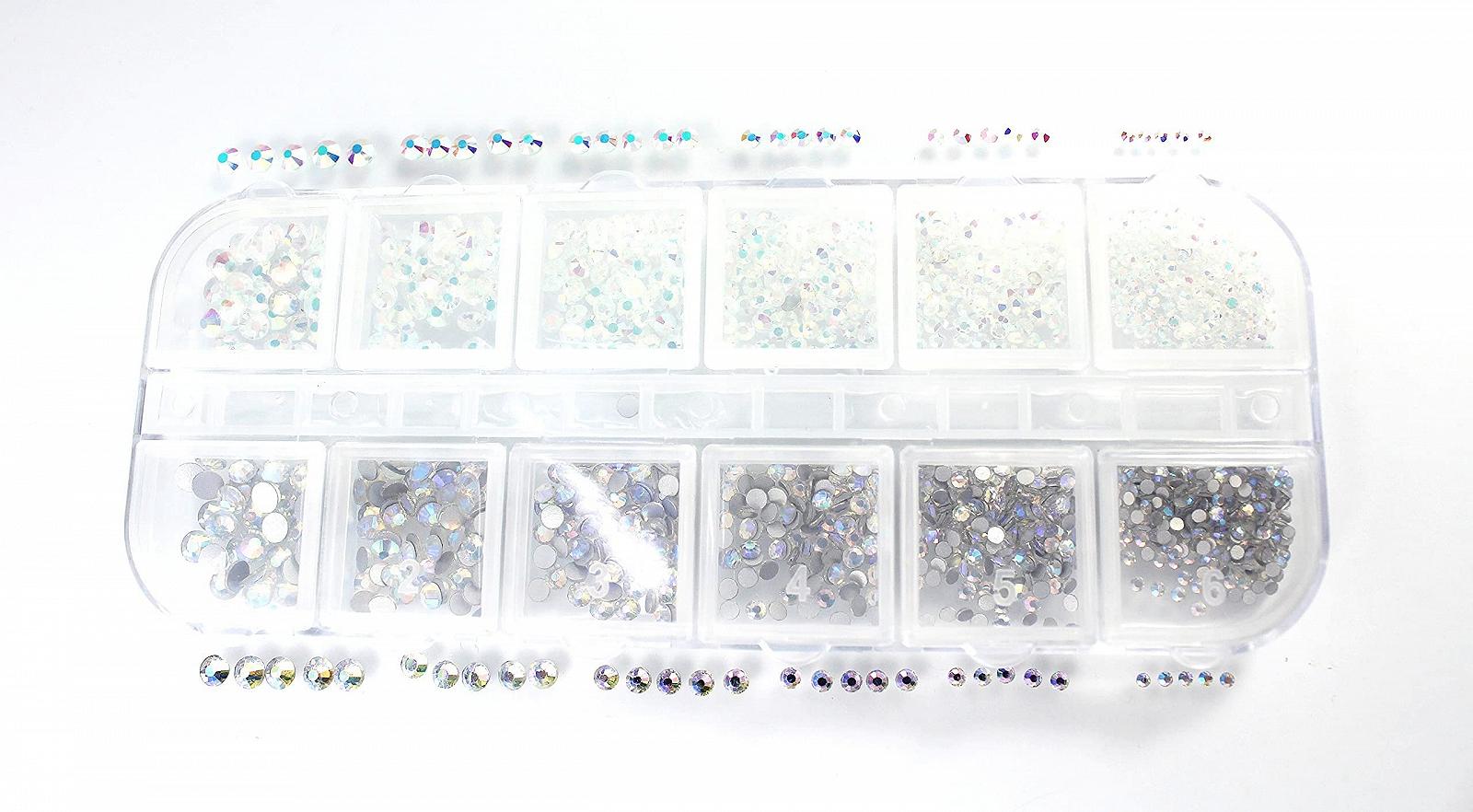 Стразы Aurora Crystal AB KM-Nails 6 Размеров Около 1440 штук в коробке 12, фото №2 Стразы Aurora Crystal AB KM-Nails 6 Размеров Около 1440 штук в коробке 12, фото №2