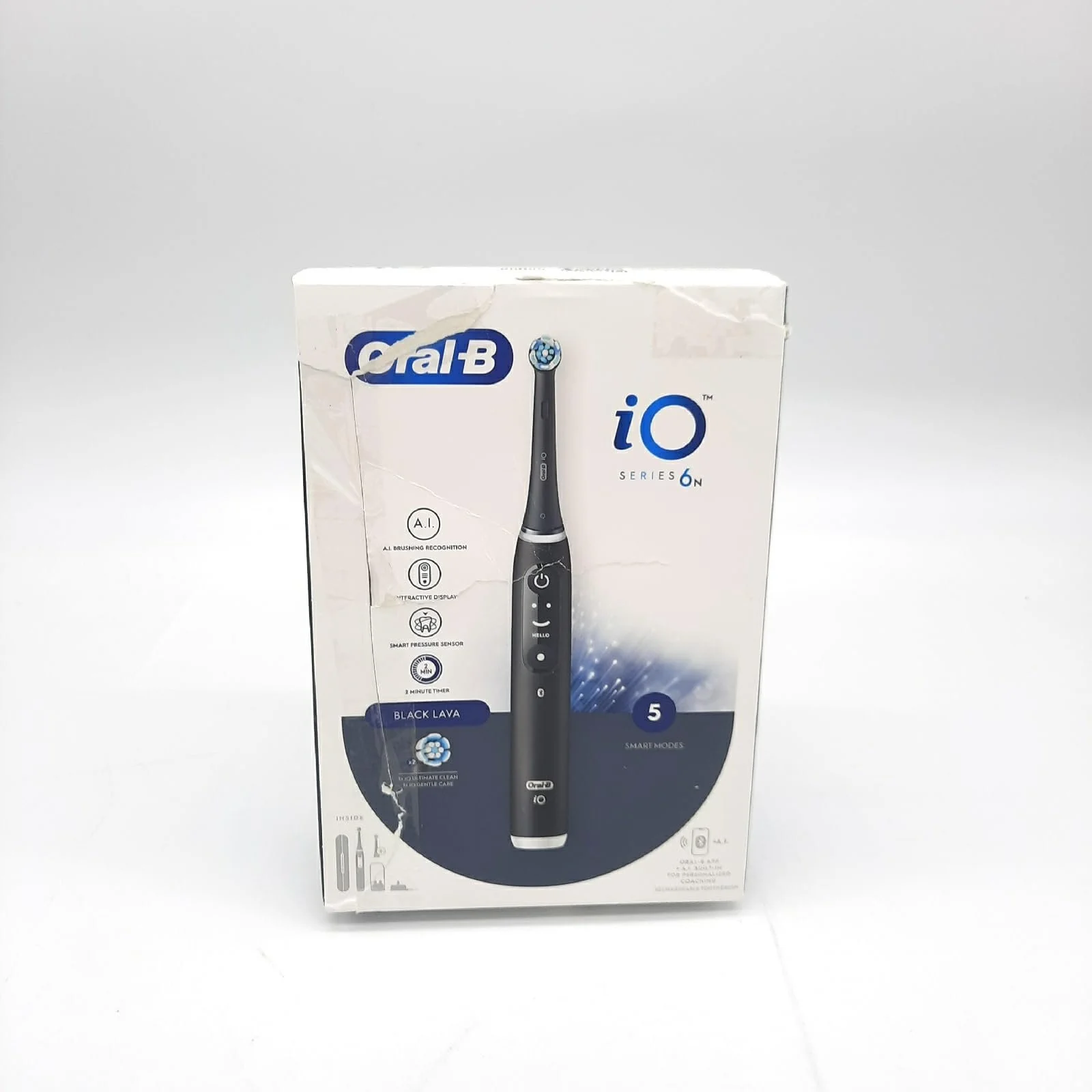 Электрическая зубная щетка Oral-B iO6 Черная с дорожным футляром и зубной пастой 75 мл, фото №1