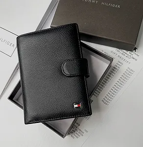 Купить Мужской портмоне кожаный вертикальный на кнопке Tommy Hilfiger - Фото 1 Мужской портмоне кожаный вертикальный на кнопке Tommy Hilfiger - Фото 1