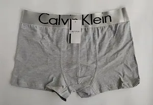 Чоловічі сірі труси боксери Calvin Klein - Фото 1