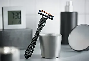 Набор одноразовых бритв BIC Flex 4 4 лезвия 5 упаковок по 4 шт. synthetic.ua - Фото 1