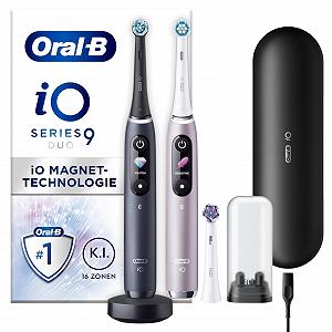 Електрична зубна щітка Oral-B iO Series 9, подвійна упаковка + 3 змінні щітки, 7 режимів чищення, магнітна технологія та 3D-аналіз, кольоровий дисплей, зарядний дорожній футляр, чорний/рожевий - Фото 1