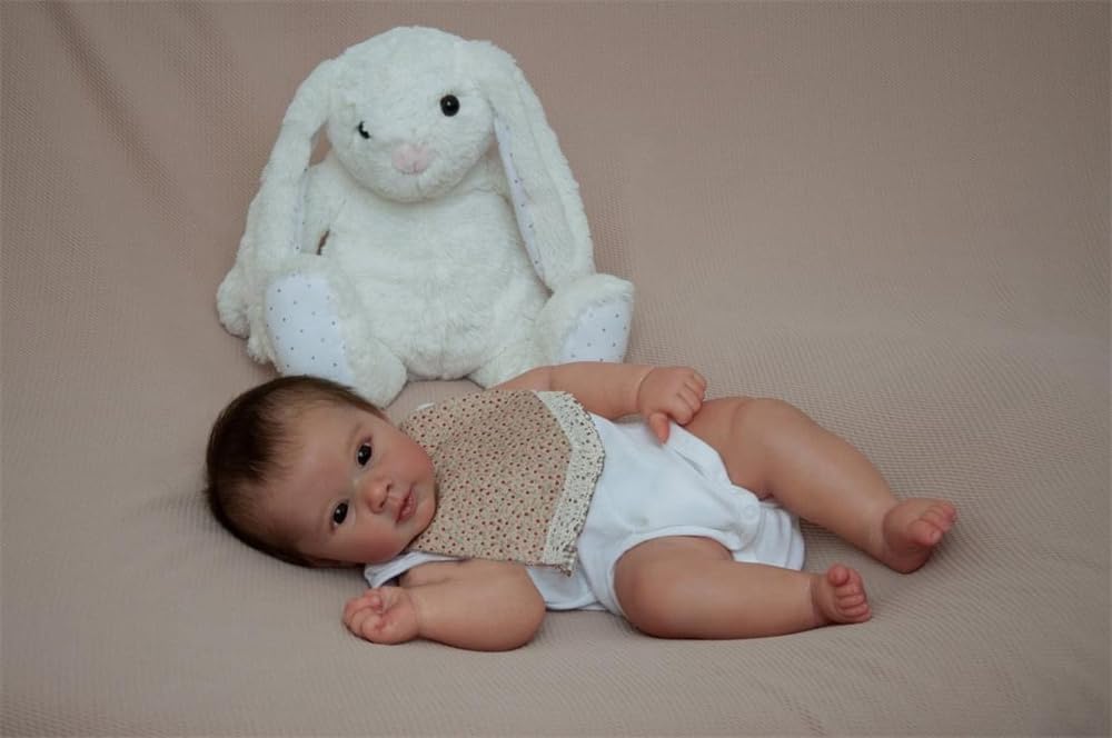Лялька Anano Lifelike Baby 50 см Reborn Реалістична новонароджена дівчинка силіконова з нагрудником та волоссям, фото №8