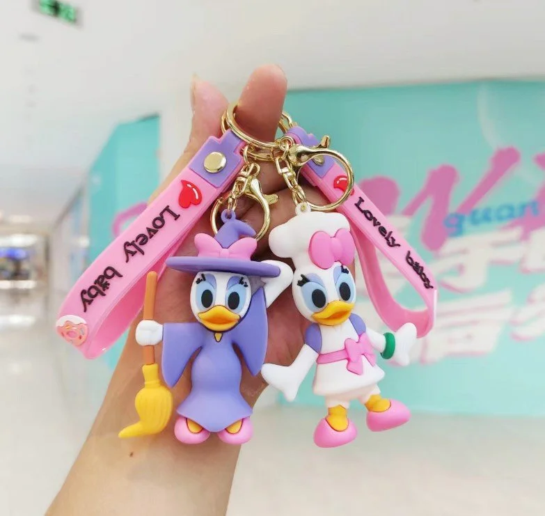 Брелок Дональд Дак Дейзі Donald Duck фігурка іграшка для ключів, рюкзака, сумки 7,5 см, фото №6 Брелок Дональд Дак Дейзі Donald Duck фігурка іграшка для ключів, рюкзака, сумки 7,5 см, фото №6