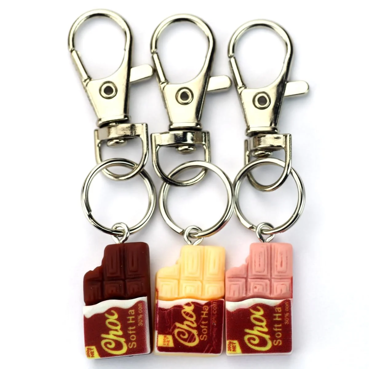 Набір: крем для рук, олія для нігтів SKINTRIX Chocolate & Cheers, подарункова сумка зі штучної шкіри та брелок у формі шоколадки, фото №4