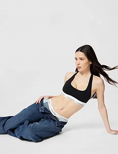 Бюстгальтер-бралетт Calvin Klein без підкладки з логотипом на поясі ціна на synthetic.ua - Фото 1 Бюстгальтер-бралетт Calvin Klein без підкладки з логотипом на поясі synthetic.ua - Фото 1