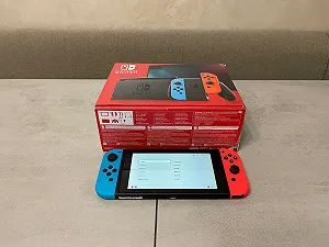 Портативна ігрова приставка Nintendo Switch HAC-001-01 Neon Blue-Red, нова, повний комплект - Фото 1