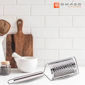 Терка OMAGO, маленька для сиру, цедри лимона, овальна ручка, нержавіюча сталь synthetic.ua - Фото 1