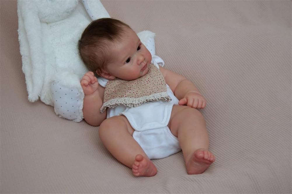 Лялька Anano Lifelike Baby 50 см Reborn Реалістична новонароджена дівчинка силіконова з нагрудником та волоссям, фото №4