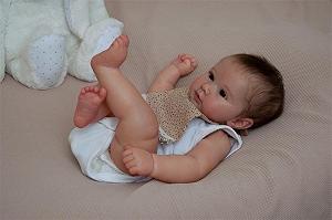 Лялька Anano Lifelike Baby 50 см Reborn Реалістична новонароджена дівчинка силіконова з нагрудником та волоссям - Фото 1