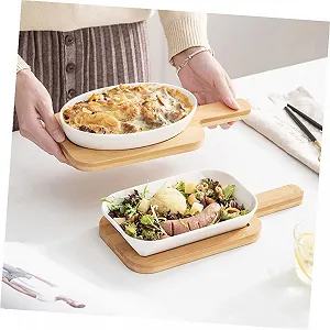 Форма для запекания керамическая овальная с деревянной подставкой цена на synthetic.ua - Фото 1 Форма для запекания керамическая овальная с деревянной подставкой synthetic.ua - Фото 1