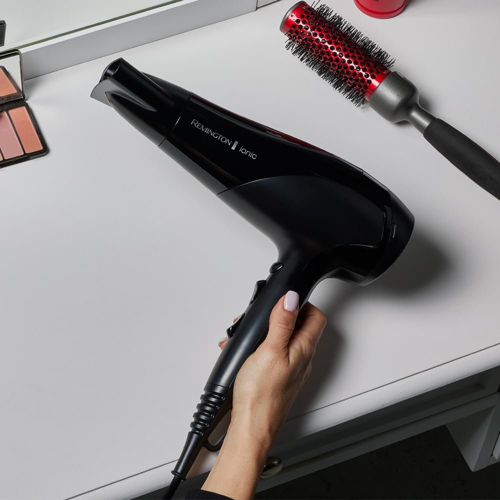 Фен Remington Ionic D3198, 2200 Вт, кольцо с керамическим покрытием Ion Care: мягкая укладка и равномерное распределение тепла, 3 режима нагрева и 2 отдельных режима вентилятора + режим холодного воздуха, 2 насадки, фото №6