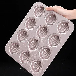 Форма для мадлен CANDeal на 12 ячеек антипригарная в форме ракушек Champagne Gold цена на synthetic.ua - Фото 1 Форма для мадлен CANDeal на 12 ячеек антипригарная в форме ракушек Champagne Gold synthetic.ua - Фото 1