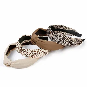 Обруч на голову Комплект 4 шт. Однотонні та з леопардовим принтом - Фото 1