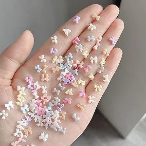 Украшения для ногтей Бантики 3D 80 шт Разноцветные synthetic.ua - Фото 1