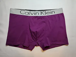 Чоловічі фіолетові труси боксери Calvin Klein - Фото 1
