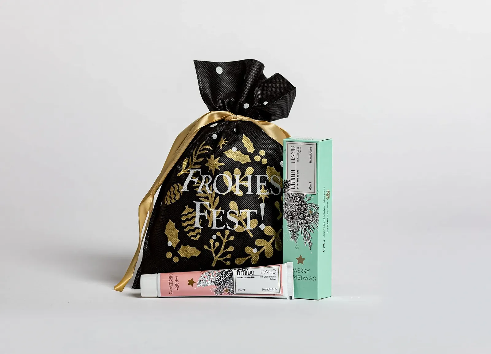 Крем для рук UMIDO Pomegranate + Aloe Vera Extract в різдвяній сумці, фото №1