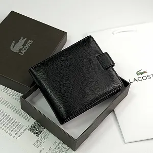 Чоловічий гаманець-портмоне Lacoste, шкіряний, на кнопці, в подарунковому упакуванні ціна на synthetic.ua - Фото 1 Чоловічий гаманець-портмоне Lacoste, шкіряний, на кнопці, в подарунковому упакуванні synthetic.ua - Фото 1
