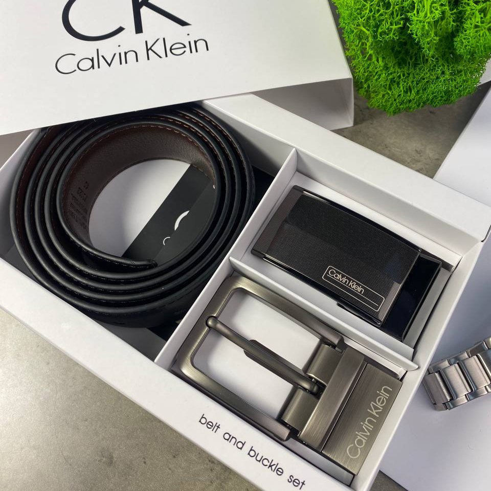 Чоловічий ремінь Calvin Klein шкіряний двосторонній чорно-коричневий з двома пряжками, фото №2 Чоловічий ремінь Calvin Klein шкіряний двосторонній чорно-коричневий з двома пряжками, фото №2