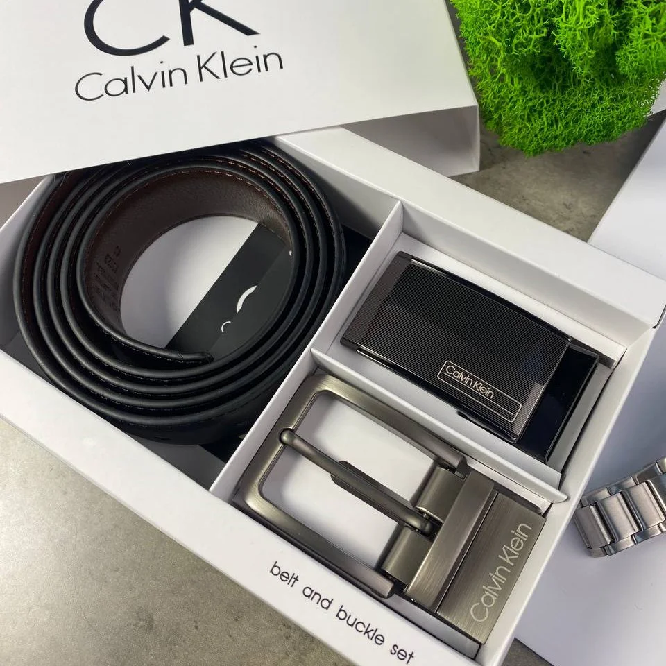 Мужской ремень Calvin Klein кожаный двусторонний черно-коричневый с двумя пряжками, фото №2 Мужской ремень Calvin Klein кожаный двусторонний черно-коричневый с двумя пряжками, фото №2