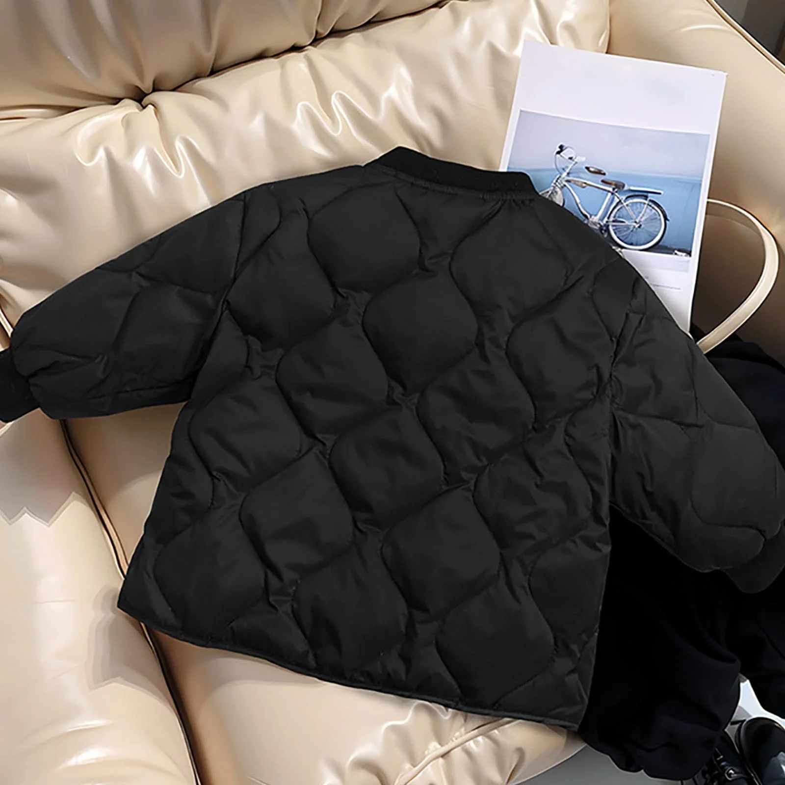 Дитяча однотонна зимова куртка для хлопчиків та дівчаток з заокругленим низом, фото №2