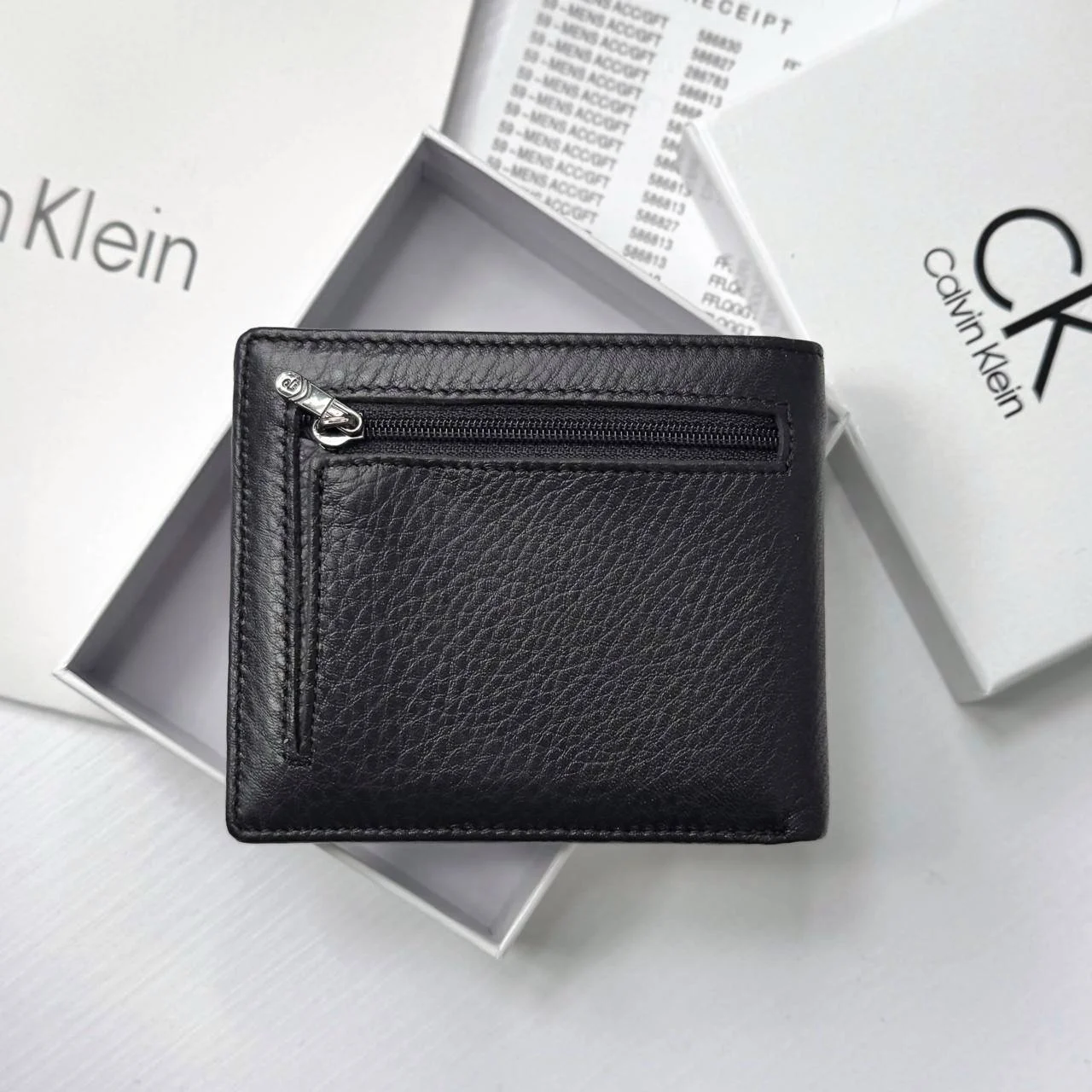 Чоловічий гаманець на магніті шкіряний брендовий Calvin Klein у подарунковій упаковці, фото №2 Чоловічий гаманець на магніті шкіряний брендовий Calvin Klein у подарунковій упаковці, фото №2