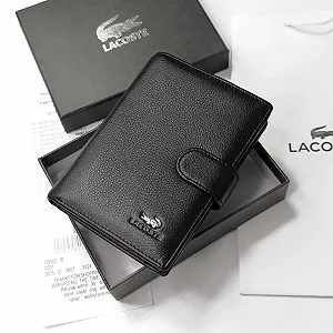 Мужское портмоне вертикальное кожаное Lacoste цена на synthetic.ua - Фото 1 Мужское портмоне вертикальное кожаное Lacoste synthetic.ua - Фото 1