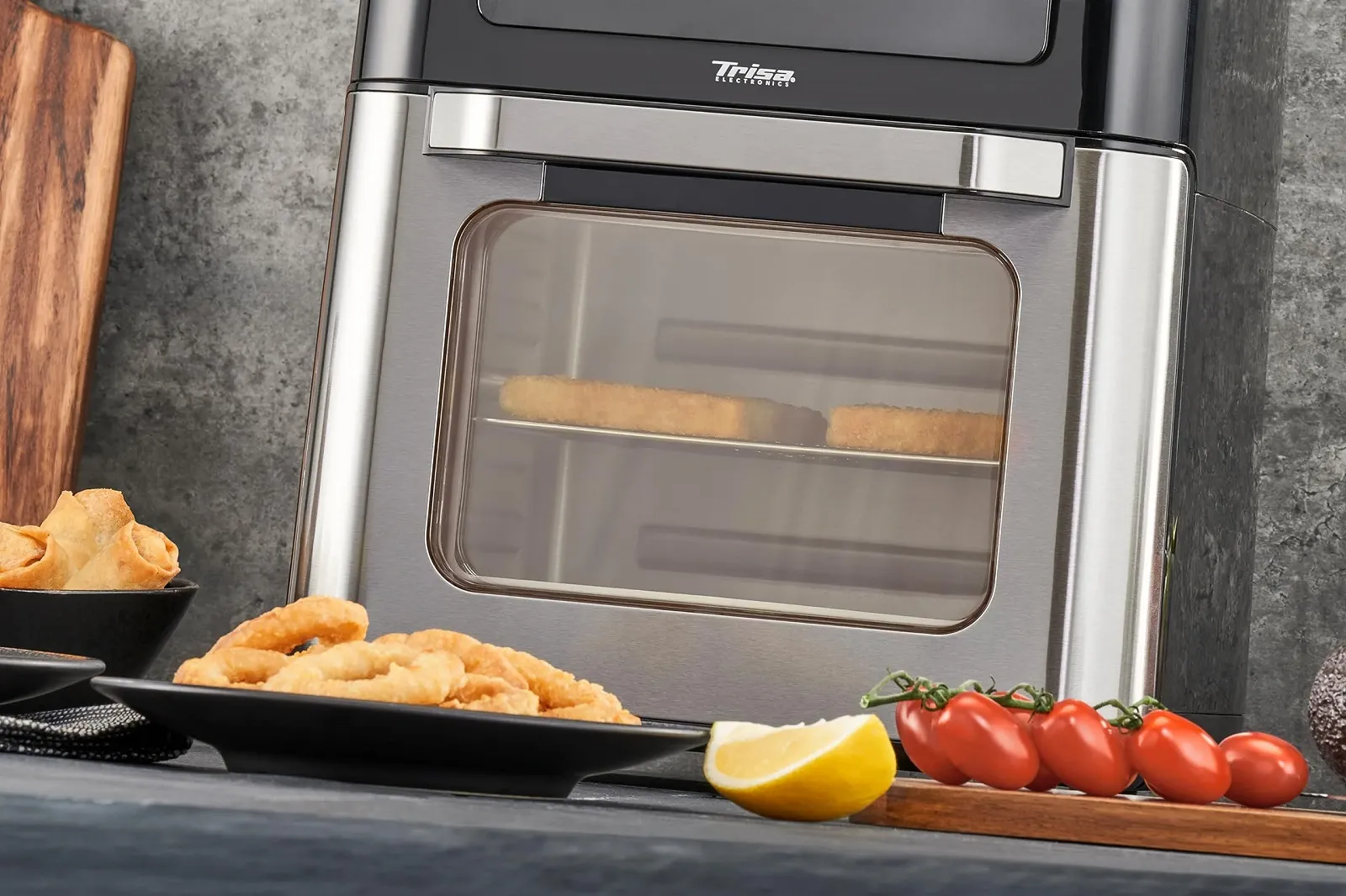 Мультипечь-духовка Trisa Crisp Master XXL 12 л 12-в-1 серебристый/черный, фото №6 Мультипечь-духовка Trisa Crisp Master XXL 12 л 12-в-1 серебристый/черный, фото №6