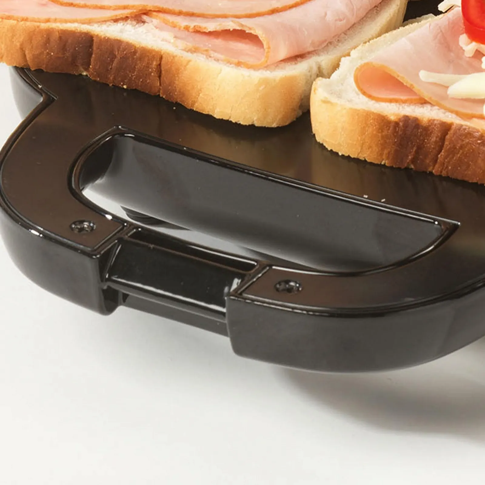 Сэндвичница Salter EK3677 Форма Сумочки 750 Вт, фото №7 Сэндвичница Salter EK3677 Форма Сумочки 750 Вт, фото №7