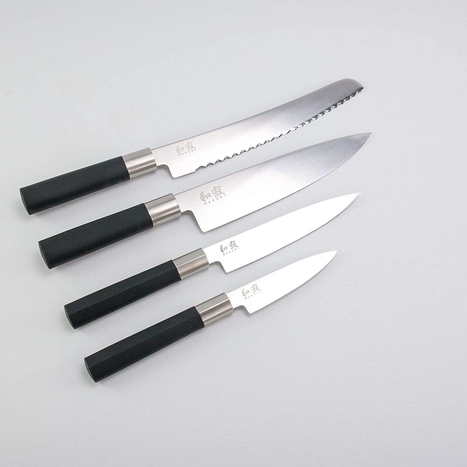 Набір ножів (4 шт.) KAI Wasabi Black Шеф-ніж + Універсальний ніж + Офісний ніж + Ніж для хліба + Блок для ножів, фото №5