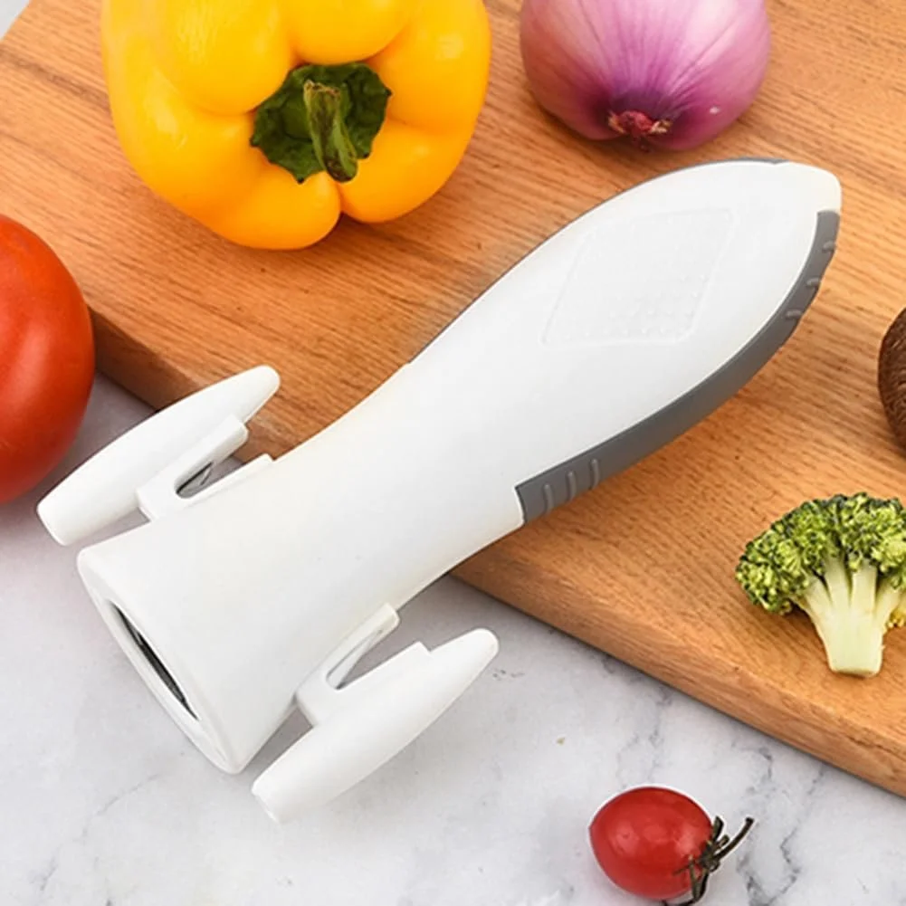 Багатофункціональний кухонний інструмент 5-в-1 овочечистка ніж відкривачка точилка та прес для часнику у формі ракети Чорний, фото №6