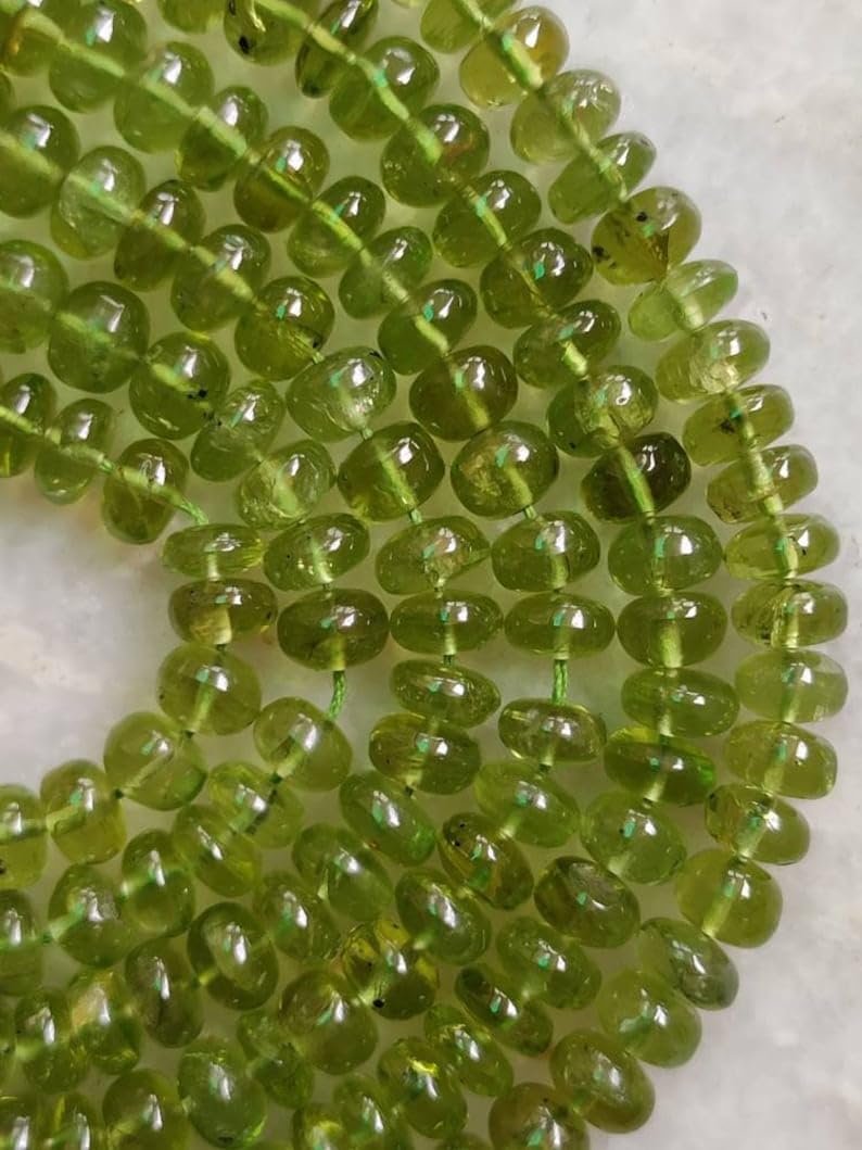 Бусины Peridot рондель гладкие 4.5-6.5 мм зеленый, фото №1