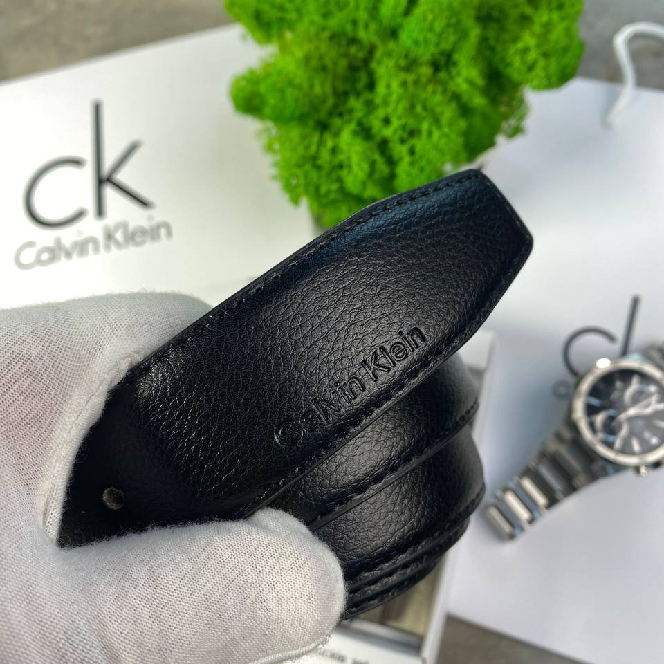 Чоловічий ремінь Calvin Klein шкіряний двосторонній чорно-коричневий з двома пряжками, фото №3 Чоловічий ремінь Calvin Klein шкіряний двосторонній чорно-коричневий з двома пряжками, фото №3