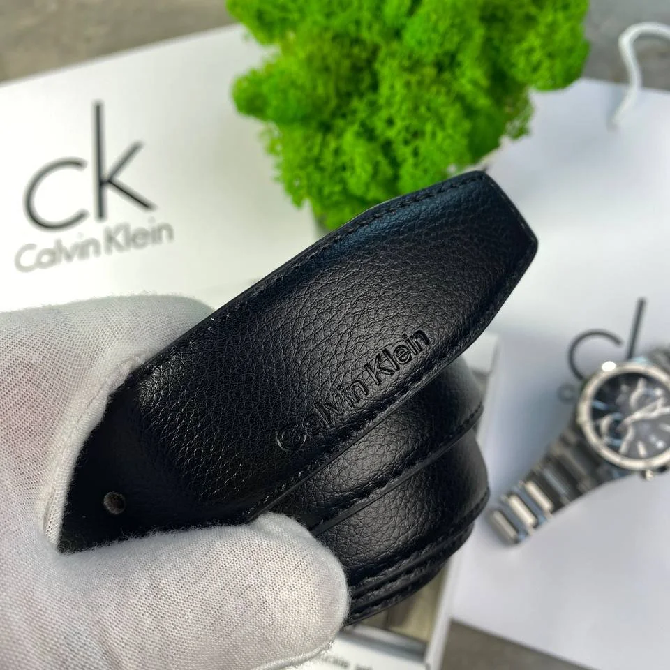 Мужской ремень Calvin Klein кожаный двусторонний черно-коричневый с двумя пряжками, фото №3 Мужской ремень Calvin Klein кожаный двусторонний черно-коричневый с двумя пряжками, фото №3