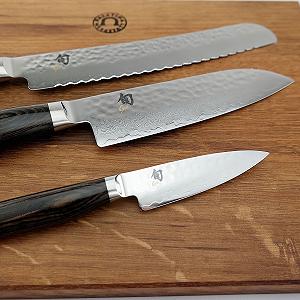 Набір ножів KAI Shun Premier Tim Mälzer (TDM-1700, TDM-1702, TDM-1705) + обробна дошка 40 x 30 см synthetic.ua - Фото 1