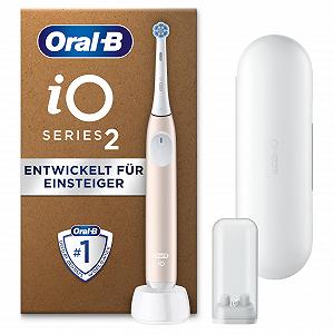Електрична зубна щітка Oral-B iO Series 2, 1 насадка, 3 режими чищення, дорожній футляр, тримач для змінних насадок, спокійний рожевий - Фото 1