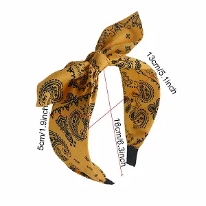 Обруч на голову с широким бантом для женщин synthetic.ua - Фото 1